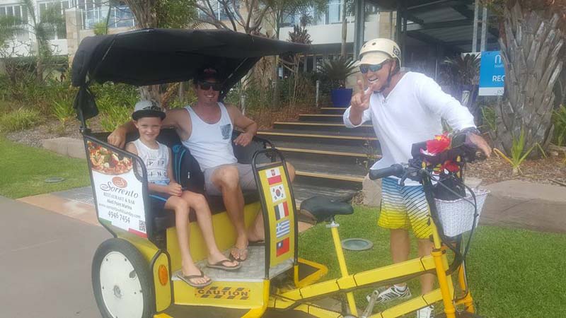 Take in the sights and sounds of Airlie Beach from the back of a tuk-tuk!